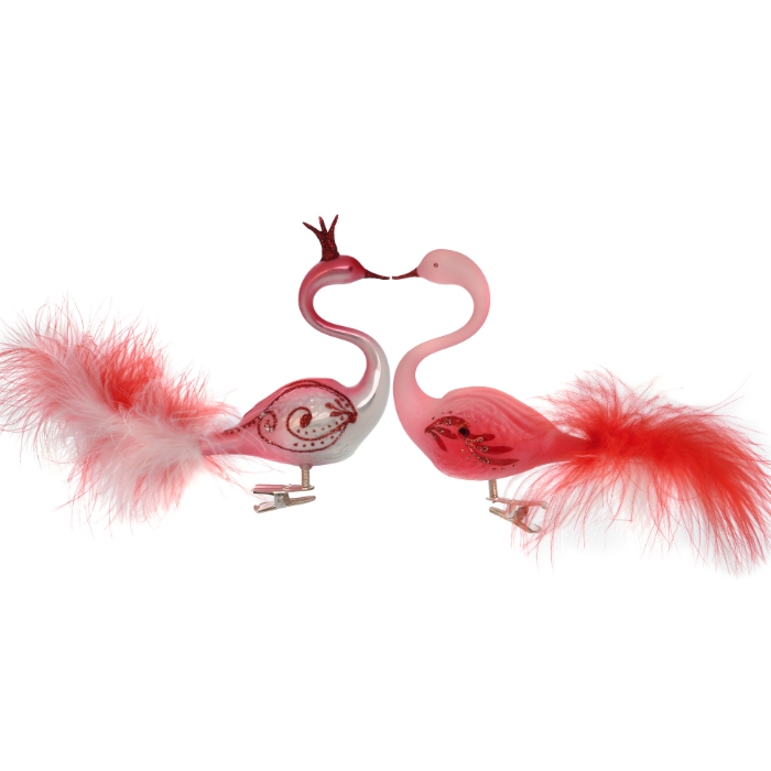 Pár labutí červenej a bielej farby